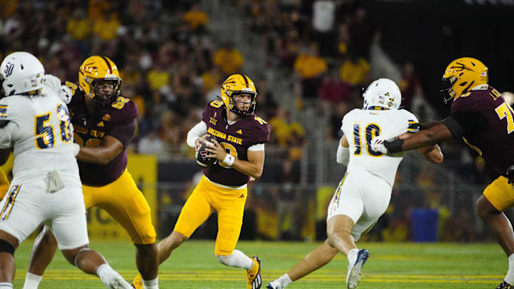 Arizona State quarterback Sam Leavitt (10) looks for a receiver against NAU during a game at Mountain America Stadium in Tempe on Aug. 30, 2025.