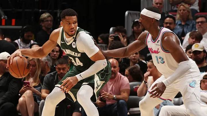 April 5, 2025, Miami, FL, USA: The Milwaukee Bucks' Giannis Antetokounmpo (34) dribbles the ball against the Miami Heat's Bam Adebayo (13). April 5, 2025, Miami, FL, USA: The Milwaukee Bucks' Giannis Antetokounmpo (34) dribbles the ball against the Miami Heat's Bam Adebayo (13).