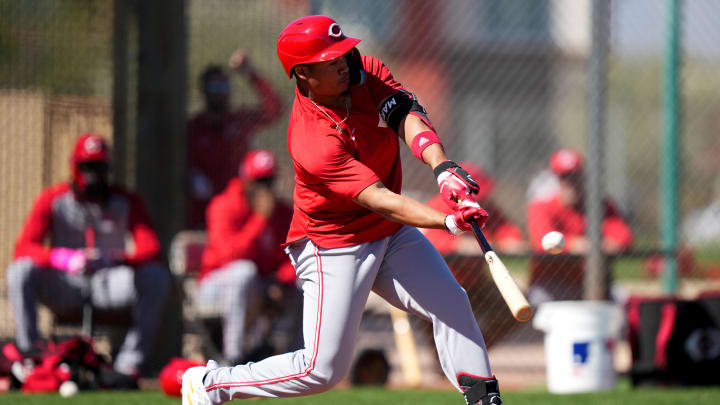 Cincinnati Reds infielder Noelvi Marte hits a pitch during live batting practice at spring training workouts at Goodyear Ballpark on Feb. 20.