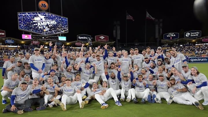 Oct 20, 2024; Los Angeles, California, USA; The Los Angeles Dodgers celebrate on the field after defeating the New York Mets in game six of the NLCS for the 2024 MLB playoffs to advance to the World Series at Dodger Stadium. Mandatory Credit: Jayne Kamin-Oncea-Imagn Images