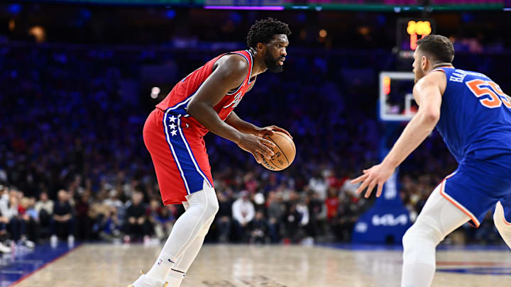 Jan 5, 2024; Philadelphia, Pennsylvania, USA; Philadelphia 76ers center Joel Embiid (21) controls the ball against the Knicks. 