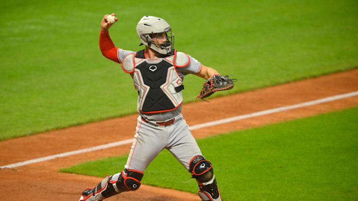 Sep 24, 2024; Cleveland, Ohio, USA; Cincinnati Reds catcher Tyler Stephenson (37) throws to first base in the fifth inning against the Cleveland Guardians at Progressive Field. Mandatory Credit: David Richard-Imagn Images