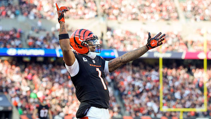 Cincinnati Bengals wide receiver Ja'Marr Chase (1) celebrates a touchdown by Tee Higgins in the second quarter of the NFL Week 18 game between the Cincinnati Bengals and the Cleveland Browns at Paycor Stadium in Downtown Cincinnati on Sunday, Jan. 4, 2026. Cincinnati Bengals wide receiver Ja'Marr Chase (1) celebrates a touchdown by Tee Higgins in the second quarter of the NFL Week 18 game between the Cincinnati Bengals and the Cleveland Browns at Paycor Stadium in Downtown Cincinnati on Sunday, Jan. 4, 2026.