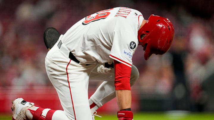 Cincinnati Reds center fielder TJ Friedl (29) takes a knee after being hit by a pitch in the third inning of the MLB interleague game between the Cincinnati Reds and the Chicago White Sox at Great American Ball Park in Cincinnati on Tuesday, May 13, 2025. The score was 0-0 after three innings.