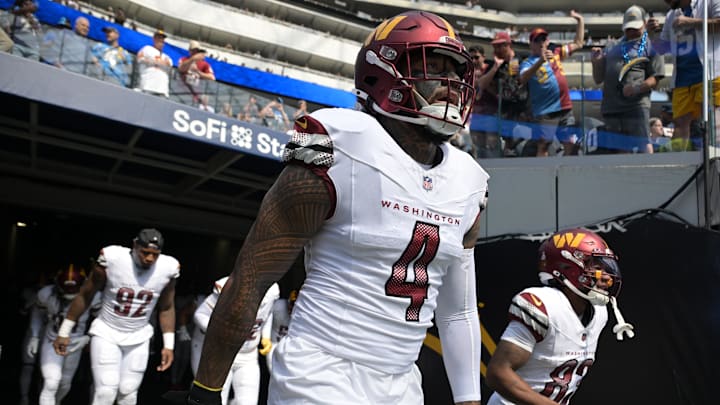 Washington Commanders linebacker Frankie Luvu had his one-game suspension overturned.