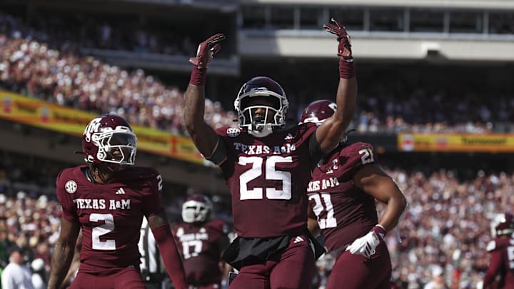 Nov 15, 2025; College Station, Texas, USA; Texas A&M Aggies safety Dalton Brooks (25) reacts after an interception during the second quarter against the South Carolina Gamecocks at Kyle Field. Mandatory Credit: Troy Taormina-Imagn Images