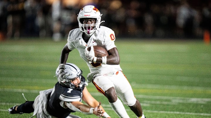 Ankeny’s Daniel Larmie (0) takes the ball downfield against Ankeny Centennial on Sept. 19, 2025, at Ankeny Stadium.