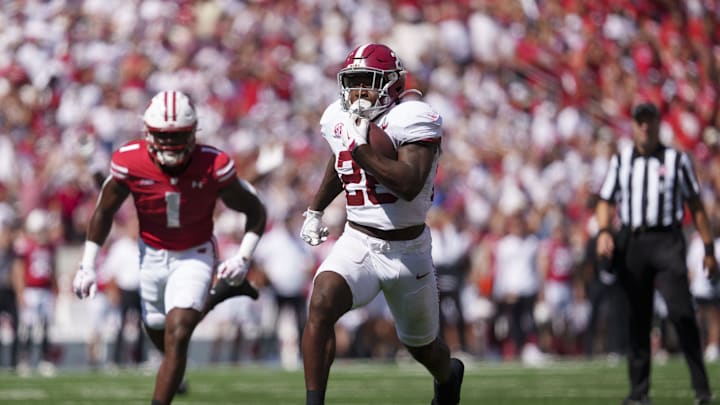 Sep 14, 2024; Madison, Wisconsin, USA;  Alabama Crimson Tide running back Jam Miller (26) rushes for a touchdown during the third quarter against the Wisconsin Badgers at Camp Randall Stadium. Mandatory Credit: Jeff Hanisch-Imagn Images
