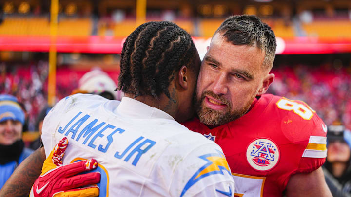 Dec 14, 2025; Kansas City, Missouri, USA; Kansas City Chiefs tight end Travis Kelce (87) talks with Los Angeles Chargers safety Derwin James Jr. (3) following a Chargers victory at GEHA Field at Arrowhead Stadium. Mandatory Credit: Jay Biggerstaff-Imagn Images Dec 14, 2025; Kansas City, Missouri, USA; Kansas City Chiefs tight end Travis Kelce (87) talks with Los Angeles Chargers safety Derwin James Jr. (3) following a Chargers victory at GEHA Field at Arrowhead Stadium. Mandatory Credit: Jay Biggerstaff-Imagn Images