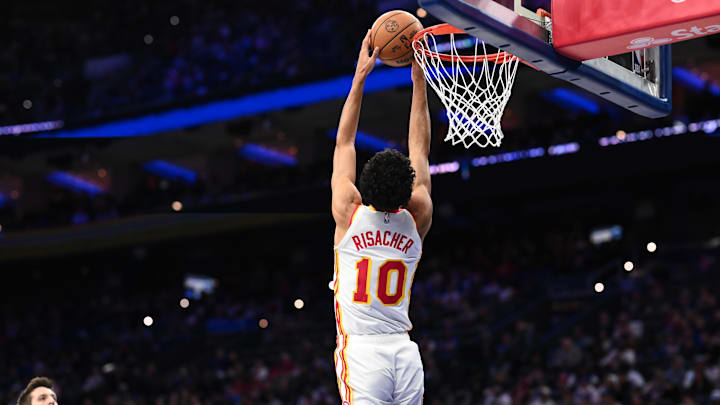 Apr 11, 2025; Philadelphia, Pennsylvania, USA; Atlanta Hawks forward Zaccharie Risacher (10) dunks against the Philadelphia 76ers in the second quarter at Wells Fargo Center. Mandatory Credit: Kyle Ross-Imagn Images