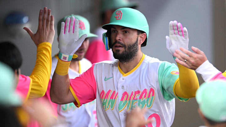 Jul 29, 2022; San Diego, California, USA; San Diego Padres first baseman Eric Hosmer (30) is congratulated in the dugout after hitting a home run against the Minnesota Twins during the fourth inning at Petco Park. Mandatory Credit: Orlando Ramirez-Imagn Images Jul 29, 2022; San Diego, California, USA; San Diego Padres first baseman Eric Hosmer (30) is congratulated in the dugout after hitting a home run against the Minnesota Twins during the fourth inning at Petco Park. Mandatory Credit: Orlando Ramirez-Imagn Images
