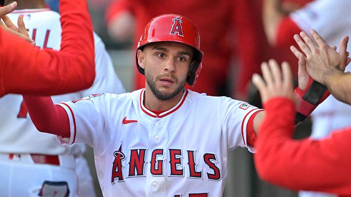 Jun 8, 2026; Anaheim, California, USA;  Los Angeles Angels third baseman Nick Madrigal (17) is greeted in the dugout after scoring a run in the second inning against the Houston Astros at Angel Stadium. Mandatory Credit: Jayne Kamin-Oncea-Imagn Images