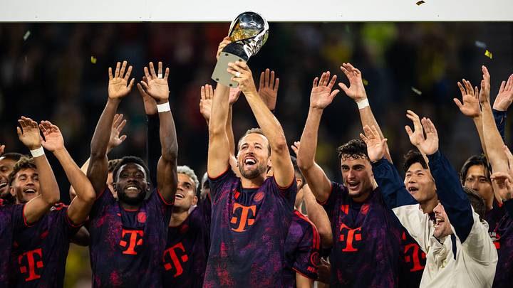 Bayern Munich players lifting the Franz Beckenbauer Supercup.