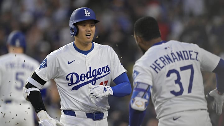 Apr 16, 2025; Los Angeles, California, USA; Los Angeles Dodgers designated hitter Shohei Ohtani (17) celebrates with left fielder Teoscar Hernandez (37) after scoring a solo home run against the Colorado Rockies in the first inning at Dodger Stadium. Mandatory Credit: Jayne Kamin-Oncea-Imagn Images Apr 16, 2025; Los Angeles, California, USA; Los Angeles Dodgers designated hitter Shohei Ohtani (17) celebrates with left fielder Teoscar Hernandez (37) after scoring a solo home run against the Colorado Rockies in the first inning at Dodger Stadium. Mandatory Credit: Jayne Kamin-Oncea-Imagn Images