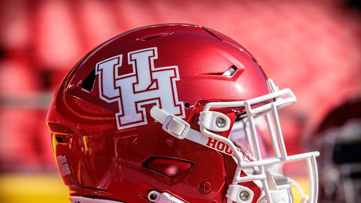 Oct 19, 2024; Kansas City, Missouri, USA; Houston Cougars helmet on the sidelines prior to the game against the Kansas Jayhawks at GEHA Field at Arrowhead Stadium. Mandatory Credit: William Purnell-Imagn Images Oct 19, 2024; Kansas City, Missouri, USA; Houston Cougars helmet on the sidelines prior to the game against the Kansas Jayhawks at GEHA Field at Arrowhead Stadium. Mandatory Credit: William Purnell-Imagn Images