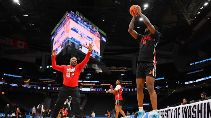 Mar 20, 2025; Seattle, WA, USA; Maryland Terrapins guard Selton Miguel (9) shoots the ball over assistant coach Kevin Norris during practice at Climate Pledge Arena. Mandatory Credit: Steven Bisig-Imagn Images Mar 20, 2025; Seattle, WA, USA; Maryland Terrapins guard Selton Miguel (9) shoots the ball over assistant coach Kevin Norris during practice at Climate Pledge Arena. Mandatory Credit: Steven Bisig-Imagn Images
