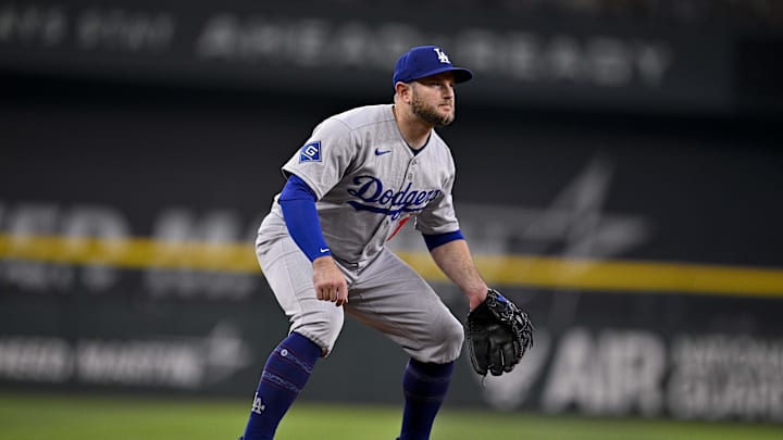 Apr 20, 2025; Arlington, Texas, USA; Los Angeles Dodgers third baseman Max Muncy (13) in action during the game between the Texas Rangers and the Los Angeles Dodgers at Globe Life Field. Mandatory Credit: Jerome Miron-Imagn Images