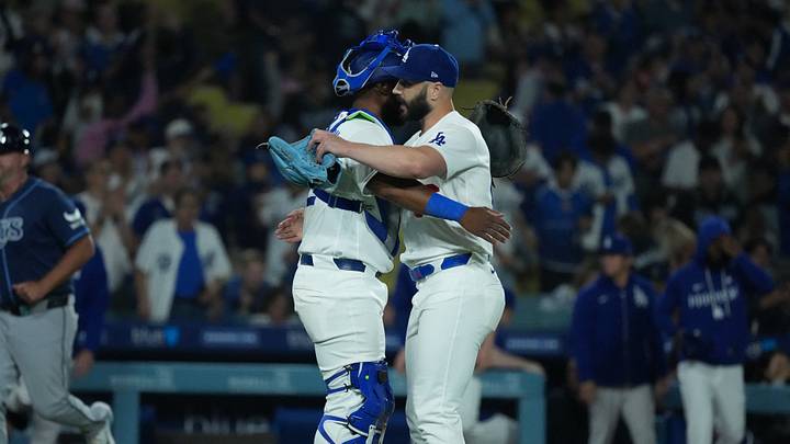 Jun 16, 2026; Los Angeles, California, USA; Los Angeles Dodgers relief pitcher Tanner Scott (66) and catcher Chuckie Robinson (52) celebrate after defeating the Tampa Bay Rays
at Dodger Stadium. Mandatory Credit: Kirby Lee-Imagn Images Jun 16, 2026; Los Angeles, California, USA; Los Angeles Dodgers relief pitcher Tanner Scott (66) and catcher Chuckie Robinson (52) celebrate after defeating the Tampa Bay Rays
at Dodger Stadium. Mandatory Credit: Kirby Lee-Imagn Images