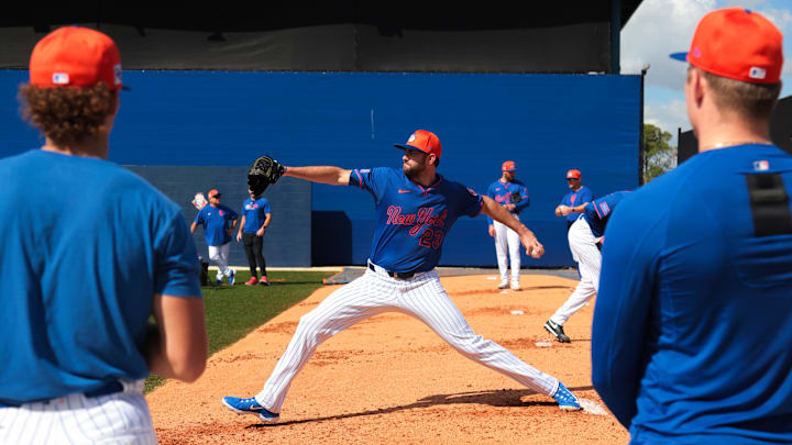Feb 12, 2025; Port St. Lucie, FL, USA; New York Mets pitcher David Peterson (23) pitches during a Spring Training workout at Clover Park. Mandatory Credit: Sam Navarro-Imagn Images
