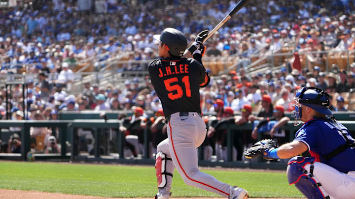 Mar 1, 2025; Phoenix, Arizona, USA; San Francisco Giants outfielder Jung Hoo Lee (51) hits against the Los Angeles Dodgers during the first inning at Camelback Ranch-Glendale. Mar 1, 2025; Phoenix, Arizona, USA; San Francisco Giants outfielder Jung Hoo Lee (51) hits against the Los Angeles Dodgers during the first inning at Camelback Ranch-Glendale.