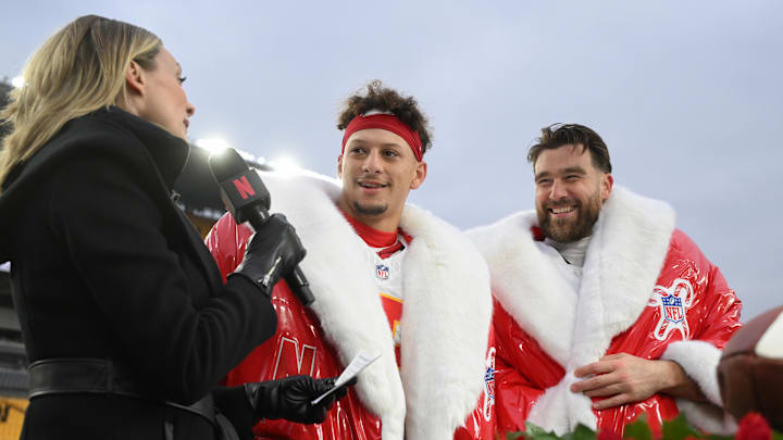 Dec 25, 2024; Pittsburgh, Pennsylvania, USA; Kansas City Chiefs quarterback Patrick Mahomes (15) and tight end Travis Kelce (87) are interviewed by Netflix reporter Stacey Dales following their win against the Pittsburgh Steelers at Acrisure Stadium. Mandatory Credit: Barry Reeger-Imagn Images Dec 25, 2024; Pittsburgh, Pennsylvania, USA; Kansas City Chiefs quarterback Patrick Mahomes (15) and tight end Travis Kelce (87) are interviewed by Netflix reporter Stacey Dales following their win against the Pittsburgh Steelers at Acrisure Stadium. Mandatory Credit: Barry Reeger-Imagn Images