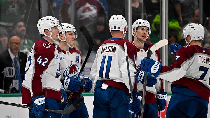 Apr 4, 2026; Dallas, Texas, USA; Colorado Avalanche defenseman Josh Manson (42) and center Nathan MacKinnon (29) and center Martin Necas (88) and center Brock Nelson (11) and defenseman Devon Toews (7) celebrates a goal scored by MacKinnon during the game between the Stars and the Avalanche at American Airlines Center. Mandatory Credit: Jerome Miron-Imagn Images Apr 4, 2026; Dallas, Texas, USA; Colorado Avalanche defenseman Josh Manson (42) and center Nathan MacKinnon (29) and center Martin Necas (88) and center Brock Nelson (11) and defenseman Devon Toews (7) celebrates a goal scored by MacKinnon during the game between the Stars and the Avalanche at American Airlines Center. Mandatory Credit: Jerome Miron-Imagn Images
