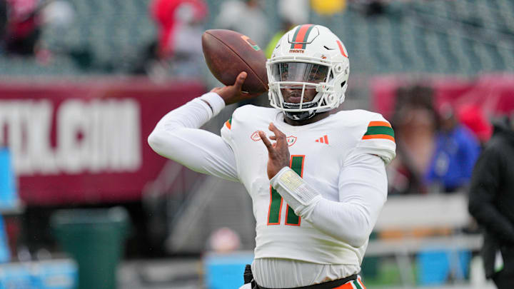 Sep 23, 2023; Philadelphia, Pennsylvania, USA; Miami Hurricanes quarterback Jacurri Brown (11) warms