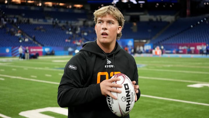 Mar 1, 2025; Indianapolis, IN, USA; Mississippi quarterback Jaxson Dart (QB03) during the 2025 NFL Combine at Lucas Oil Stadium. Mandatory Credit: Kirby Lee-Imagn Images Mar 1, 2025; Indianapolis, IN, USA; Mississippi quarterback Jaxson Dart (QB03) during the 2025 NFL Combine at Lucas Oil Stadium. Mandatory Credit: Kirby Lee-Imagn Images