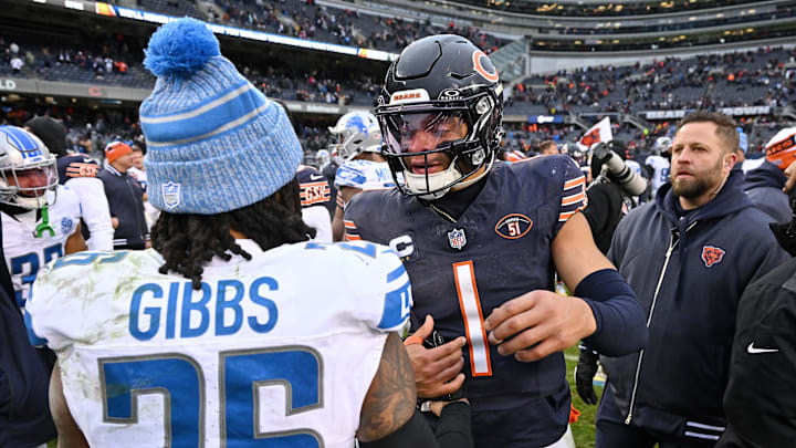 Dec 10, 2023; Chicago, Illinois, USA; Chicago Bears quarterback Justin Fields (1) shakes hands with