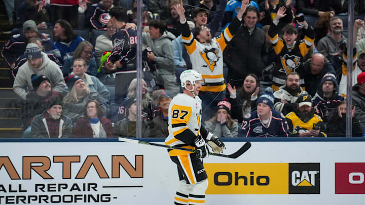 Jan 4, 2026; Columbus, Ohio, USA;  Pittsburgh Penguins center Sidney Crosby (87) celebrates scoring the game-winning goal against the Columbus Blue Jackets in the overtime period at Nationwide Arena. Mandatory Credit: Aaron Doster-Imagn Images
