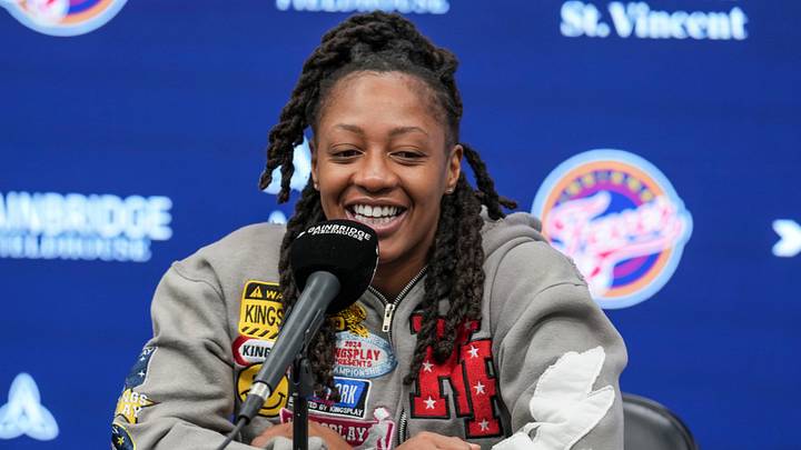 Indiana Fever guard Kelsey Mitchell (0) smiles Saturday, Oct. 3, 2026, during exit interviews at Gainbridge Fieldhouse in Indianapolis after the 2026 WNBA season. Indiana Fever guard Kelsey Mitchell (0) smiles Saturday, Oct. 3, 2026, during exit interviews at Gainbridge Fieldhouse in Indianapolis after the 2026 WNBA season.