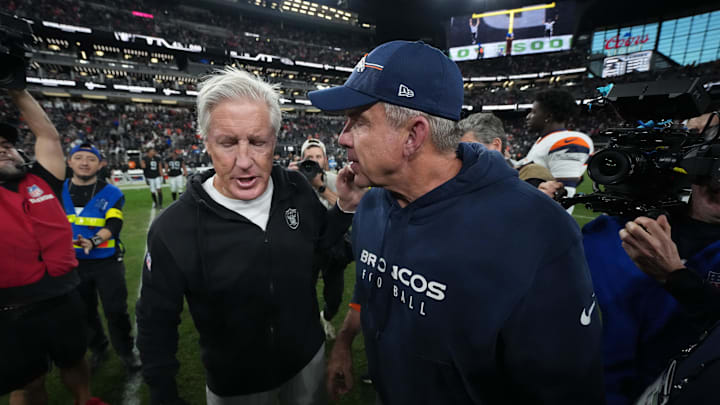 Dec 7, 2025; Paradise, Nevada, USA; Las Vegas Raiders head coach Pete Carroll and Denver Broncos head coach Sean Payton meet on the field following a game at Allegiant Stadium. Mandatory Credit: Kirby Lee-Imagn Images Dec 7, 2025; Paradise, Nevada, USA; Las Vegas Raiders head coach Pete Carroll and Denver Broncos head coach Sean Payton meet on the field following a game at Allegiant Stadium. Mandatory Credit: Kirby Lee-Imagn Images