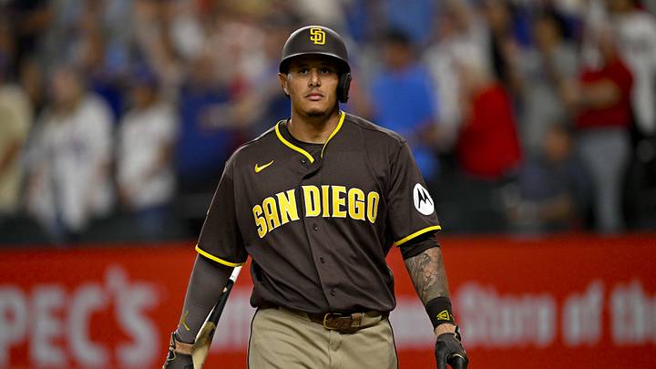 Jun 19, 2026; Arlington, Texas, USA; San Diego Padres third baseman Manny Machado (13) walks off the field after hitting a pop fly for the final out during the ninth inning against the Texas Rangers at Globe Life Field. Mandatory Credit: Jerome Miron-Imagn Images