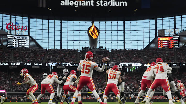 Nov 26, 2023; Paradise, Nevada, USA; Kansas City Chiefs quarterback Patrick Mahomes (15) throws the ball against the Las Vegas Raiders in the second half at Allegiant Stadium. Mandatory Credit: Kirby Lee-Imagn Images