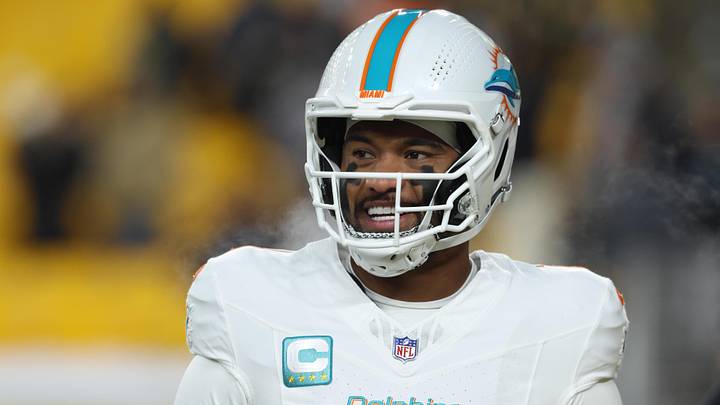 Dec 15, 2025; Pittsburgh, Pennsylvania, USA; Miami Dolphins quarterback Tua Tagovailoa (1) looks on during warm ups prior to the game against the Pittsburgh Steelers at Acrisure Stadium. Mandatory Credit: Charles LeClaire-Imagn Images