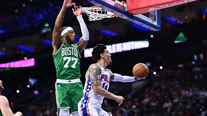 Oct 11, 2023; Philadelphia, Pennsylvania, USA; Philadelphia 76ers forward Danny Green (14) shoots against Boston Celtics forward Lamar Stevens (77) in the fourth quarter at Wells Fargo Center. Mandatory Credit: Kyle Ross-Imagn Images Oct 11, 2023; Philadelphia, Pennsylvania, USA; Philadelphia 76ers forward Danny Green (14) shoots against Boston Celtics forward Lamar Stevens (77) in the fourth quarter at Wells Fargo Center. Mandatory Credit: Kyle Ross-Imagn Images