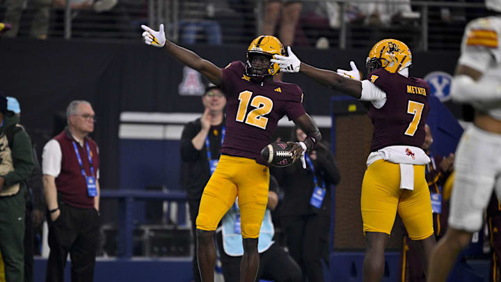 Dec 7, 2024; Arlington, TX, USA; Arizona State Sun Devils wide receiver Malik McClain (12) and tight end Chamon Metayer (7) celebrate during the game between the Iowa State Cyclones and the Arizona State Sun Devils at AT&T Stadium. Mandatory Credit: Jerome Miron-Imagn Images Dec 7, 2024; Arlington, TX, USA; Arizona State Sun Devils wide receiver Malik McClain (12) and tight end Chamon Metayer (7) celebrate during the game between the Iowa State Cyclones and the Arizona State Sun Devils at AT&T Stadium. Mandatory Credit: Jerome Miron-Imagn Images