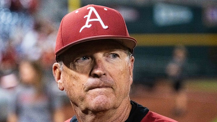 Jun 17, 2025; Omaha, Neb, USA; Arkansas Razorbacks head coach Dave Van Horn walks off the field after defeating the UCLA Bruins at Charles Schwab Field. Mandatory Credit: Dylan Widger-Imagn Images