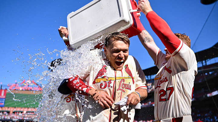 Mar 28, 2026; St. Louis, Missouri, USA; St. Louis Cardinals shortstop JJ Wetherholt (26) is doused with water by shortstop Masyn Winn (0) and left fielder Nathan Church (27) after hitting a walk-off two-run single against the Tampa Bay Rays during the tenth inning at Busch Stadium. Mandatory Credit: Jeff Curry-Imagn Images