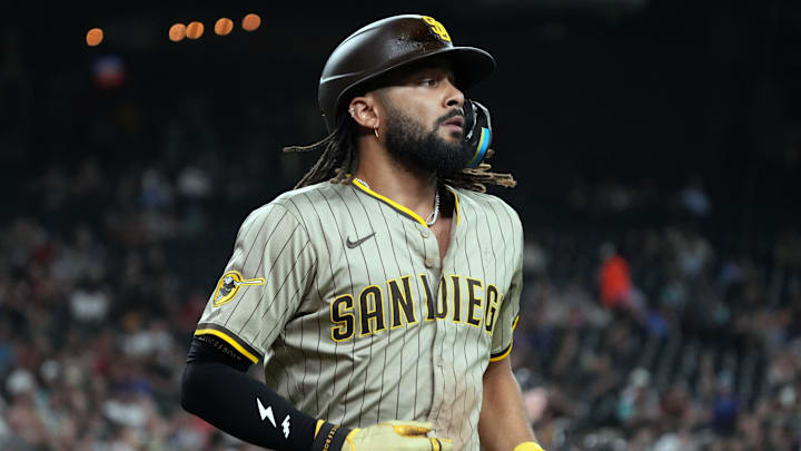 Aug 4, 2025; Phoenix, Arizona, USA; San Diego Padres outfielder Fernando Tatis Jr. (23) draws a walk against the Arizona Diamondbacks in the first inning at Chase Field. Mandatory Credit: Rick Scuteri-Imagn Images Aug 4, 2025; Phoenix, Arizona, USA; San Diego Padres outfielder Fernando Tatis Jr. (23) draws a walk against the Arizona Diamondbacks in the first inning at Chase Field. Mandatory Credit: Rick Scuteri-Imagn Images
