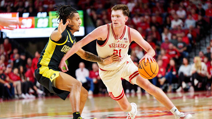 Nebraska Cornhuskers forward Pryce Sandfort drives against Oregon Ducks guard Jamari Phillips.