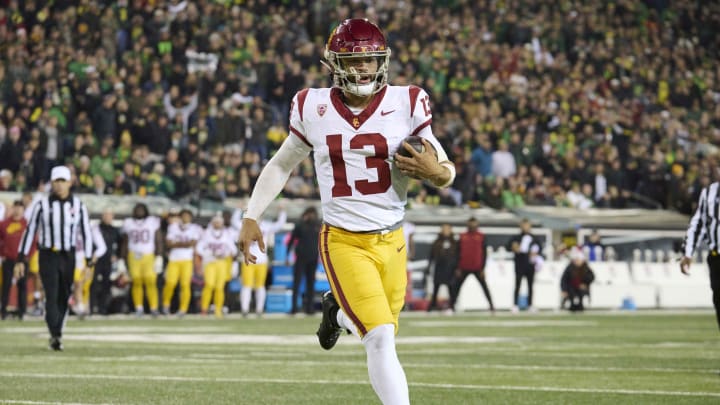 Nov 11, 2023; Eugene, Oregon, USA; USC Trojans quarterback Caleb Williams (13) scores a touchdown Nov 11, 2023; Eugene, Oregon, USA; USC Trojans quarterback Caleb Williams (13) scores a touchdown