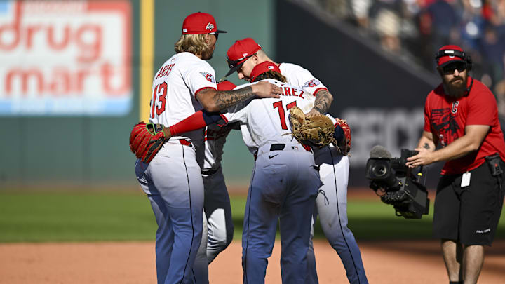 Oct 1, 2025; Cleveland, Ohio, USA; Cleveland Guardians shortstop Gabriel Arias (13) and third base José Ramírez (11) celebrates winning game two of the Wildcard round for the 2025 MLB playoffs against the Detroit Tigers at Progressive Field. Mandatory Credit: Ken Blaze-Imagn Images