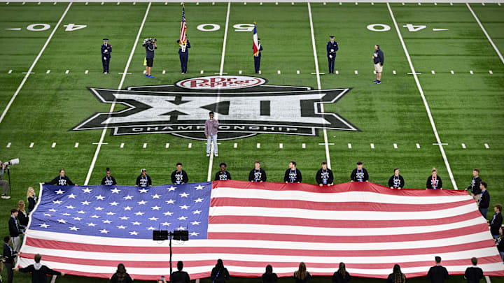 Dec 7, 2024; Arlington, TX, USA; A view of the Big 12 logo and American flag before the game between the Iowa State Cyclones and the Arizona State Sun Devils at AT&T Stadium. Mandatory Credit: Jerome Miron-Imagn Images