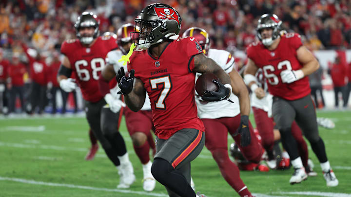 Jan 12, 2025; Tampa, Florida, USA; Tampa Bay Buccaneers running back Bucky Irving (7) runs during the third quarter of a NFC wild card playoff against the Washington Commanders at Raymond James Stadium. Mandatory Credit: Kim Klement Neitzel-Imagn Images Jan 12, 2025; Tampa, Florida, USA; Tampa Bay Buccaneers running back Bucky Irving (7) runs during the third quarter of a NFC wild card playoff against the Washington Commanders at Raymond James Stadium. Mandatory Credit: Kim Klement Neitzel-Imagn Images