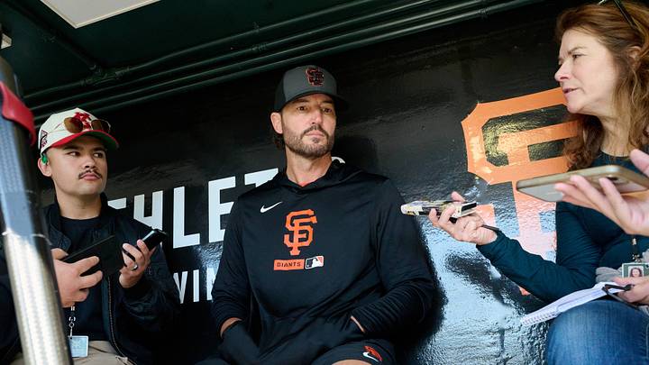 San Francisco, California, USA; San Francisco Chronicle sportswriter Susan Slusser (right) asks San Francisco Giants manager Tony Vitello (23) a question in the dugout before a game against the Arizona Diamondbacks at Oracle Park. Mandatory Credit: Robert Edwards-Imagn Images San Francisco, California, USA; San Francisco Chronicle sportswriter Susan Slusser (right) asks San Francisco Giants manager Tony Vitello (23) a question in the dugout before a game against the Arizona Diamondbacks at Oracle Park. Mandatory Credit: Robert Edwards-Imagn Images
