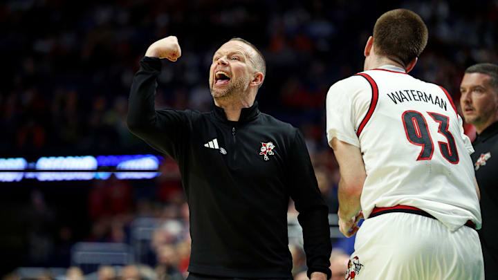 Mar 20, 2025; Lexington, KY, USA; Louisville Cardinals head coach Pat Kelsey reacts from the sidelines during the first half of the game against the Creighton Bluejays in the first round of the NCAA Tournament at Rupp Arena. Mandatory Credit: Jordan Prather-Imagn Images Mar 20, 2025; Lexington, KY, USA; Louisville Cardinals head coach Pat Kelsey reacts from the sidelines during the first half of the game against the Creighton Bluejays in the first round of the NCAA Tournament at Rupp Arena. Mandatory Credit: Jordan Prather-Imagn Images