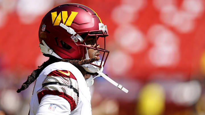 Washington Commanders wide receiver K.J. Osborn warms up before playing against the Baltimore Ravens.