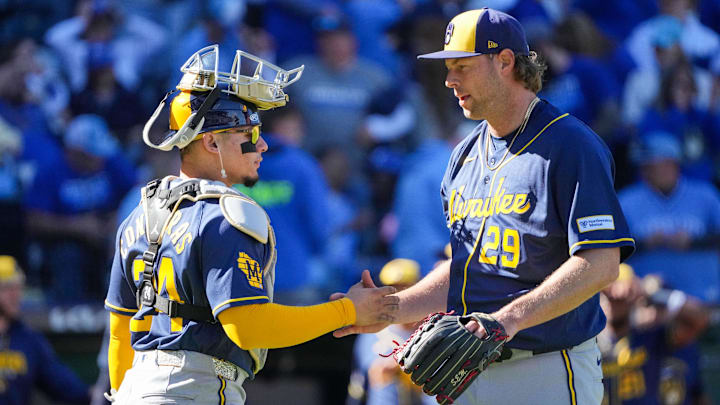 Apr 5, 2026; Kansas City, Missouri, USA;  Milwaukee Brewers pitcher Trevor Megill (29) celebrates with catcher William Contreras (24) after the win over the Kansas City Royals at Kauffman Stadium. Mandatory Credit: Denny Medley-Imagn Images