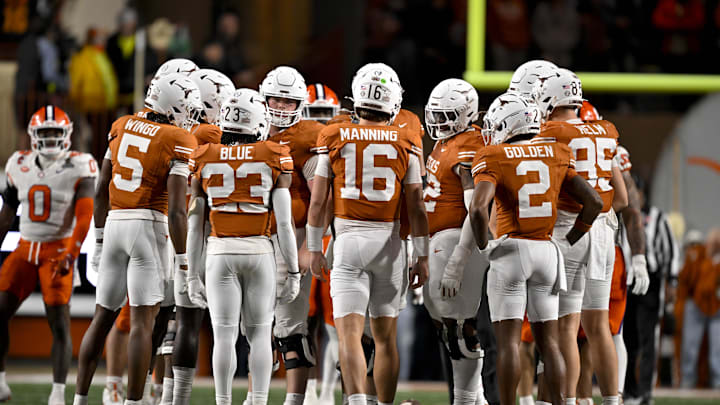 Dec 21, 2024; Austin, Texas, USA; Texas Longhorns wide receiver Ryan Wingo (5) and running back Jaydon Blue (23) and quarterback Arch Manning (16) and wide receiver Matthew Golden (2) huddle with the team during the game between the Texas Longhorns and the Clemson Tigers in the CFP National Playoff First Round at Darrell K Royal-Texas Memorial Stadium. Mandatory Credit: Jerome Miron-Imagn Images Dec 21, 2024; Austin, Texas, USA; Texas Longhorns wide receiver Ryan Wingo (5) and running back Jaydon Blue (23) and quarterback Arch Manning (16) and wide receiver Matthew Golden (2) huddle with the team during the game between the Texas Longhorns and the Clemson Tigers in the CFP National Playoff First Round at Darrell K Royal-Texas Memorial Stadium. Mandatory Credit: Jerome Miron-Imagn Images